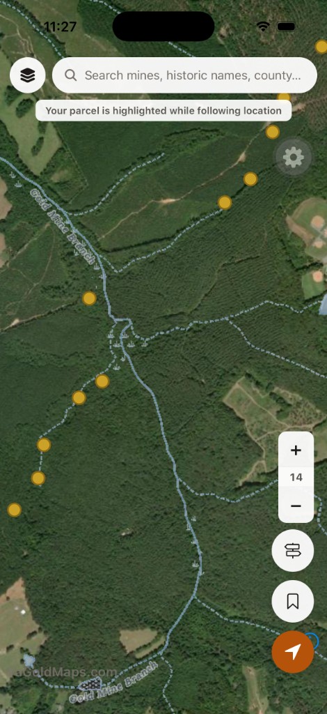 VAGoldMaps satellite view with blue stream overlays tracing Gold Mine Branch through forest, with historic mine markers along the drainage.